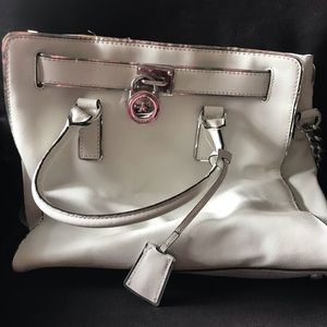 White with silver trim Michael Kors bag